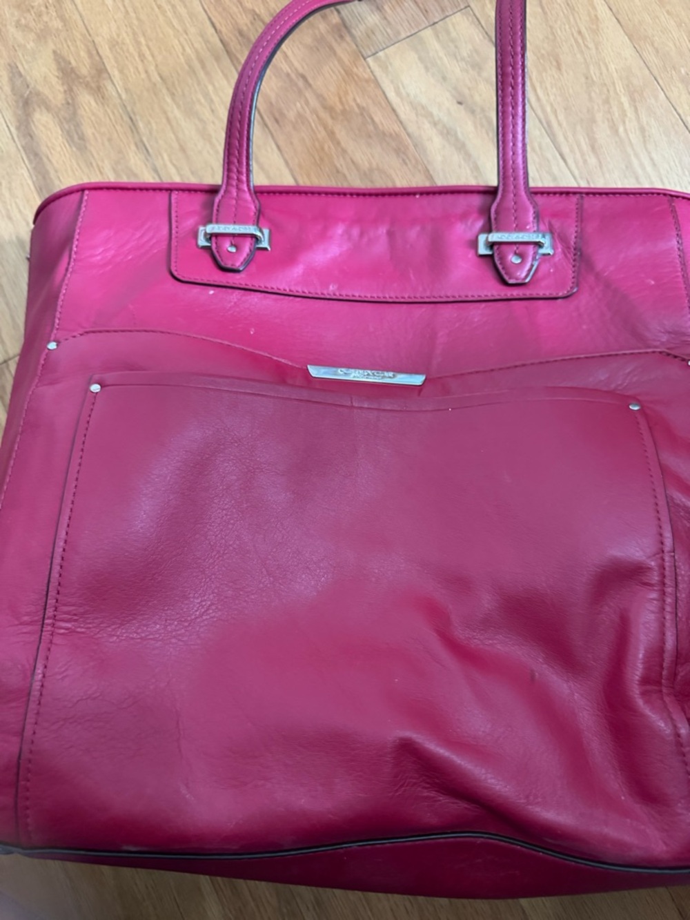 Coach leather tote with zipper expansion multiple pockets and zipper top closure